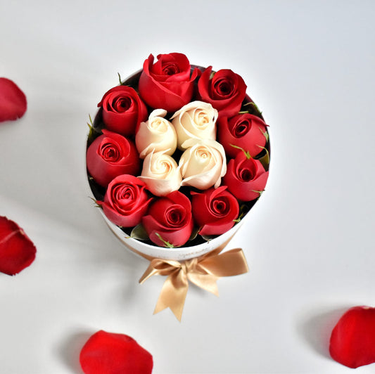 arreglo caja cilindrica de rosas rojas