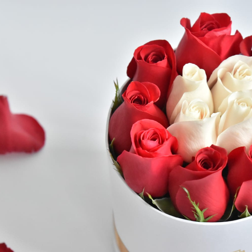 arreglo caja cilindrica de rosas rojas