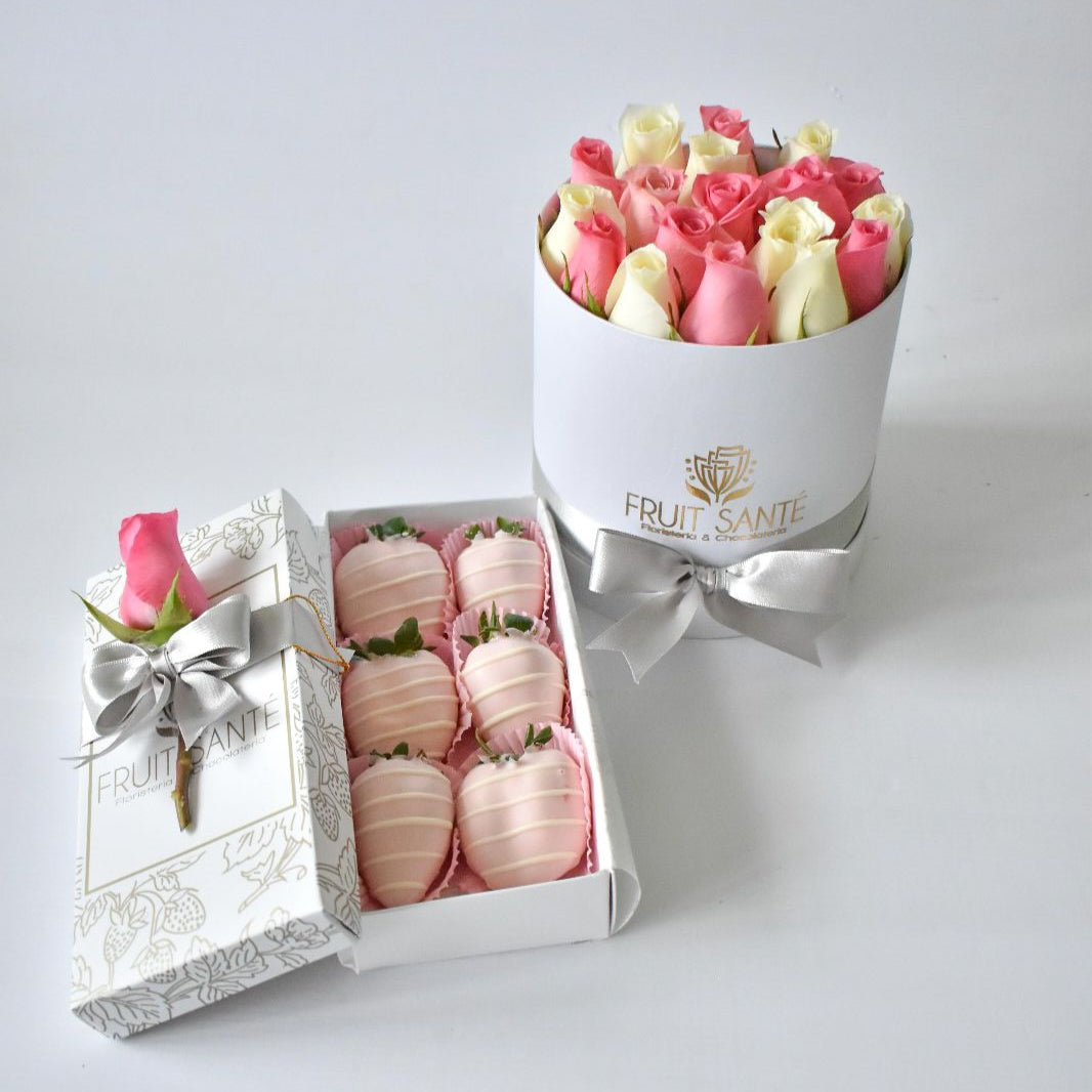 Caja cilindrica con rosas y fresas con chocolate en Bogotá