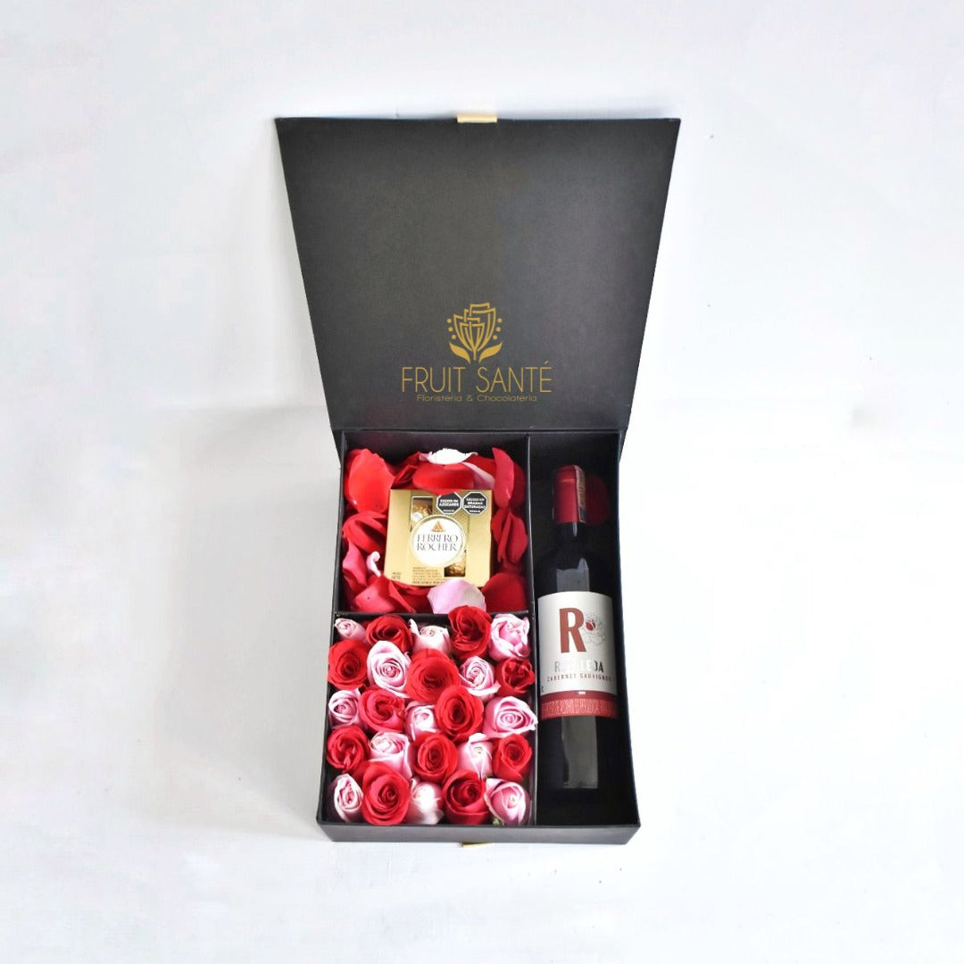 baul de rosas con vino y chocolates en Bogotá