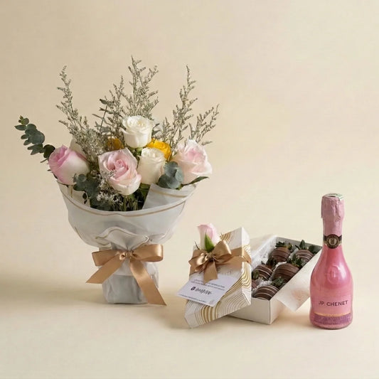 bouquet de rosas rosadas, blancas y amarillas y fresas con chocolate y champaña jp chenet