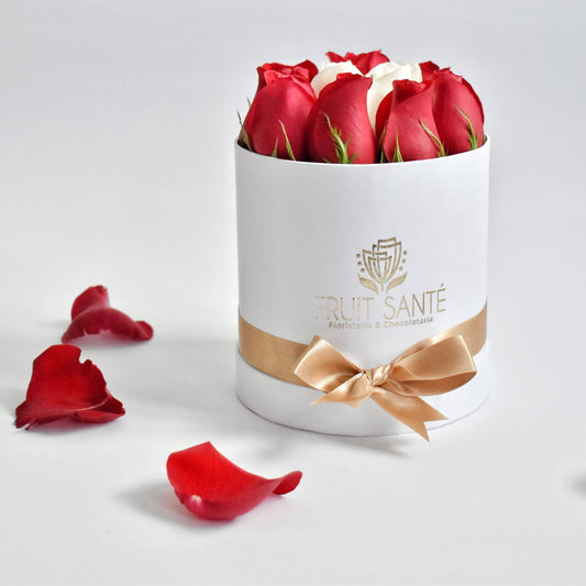 arreglo caja cilindrica de rosas rojas
