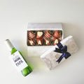 Caja de 8 Fresas premium con chocomensaje + Cerveza Stella Artois